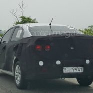 2017-Kia-Rio-sedan-rear-three-quarters-spy-shot-980x540.jpg